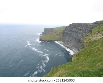 Dramatic Ocean Cliffs
Towering above the wild Atlantic, these ancient cliffs stand as nature’s fortress—carved by wind and time. Waves crash violently against the rocks below, sending up sprays 