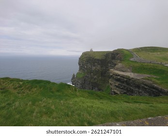Dramatic Ocean Cliffs
Towering above the wild Atlantic, these ancient cliffs stand as nature’s fortress—carved by wind and time. Waves crash violently against the rocks below, sending up sprays 