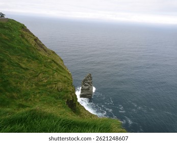 Dramatic Ocean Cliffs
Towering above the wild Atlantic, these ancient cliffs stand as nature’s fortress—carved by wind and time. Waves crash violently against the rocks below, sending up sprays 