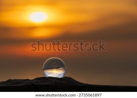 Dramatic ocean sunset with sun reflection on water and rocky shore, Portugal, Ovar – Furadouro, 14 October 2025