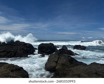 Dramatic Ocean Waves Breaking on Rocky Coastline
