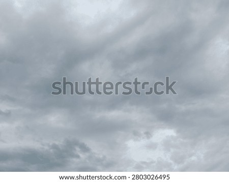 Dramatic overcast sky with dense storm clouds, ideal as a background for weather concepts, presentations, design projects, and atmospheric visual storytelling.