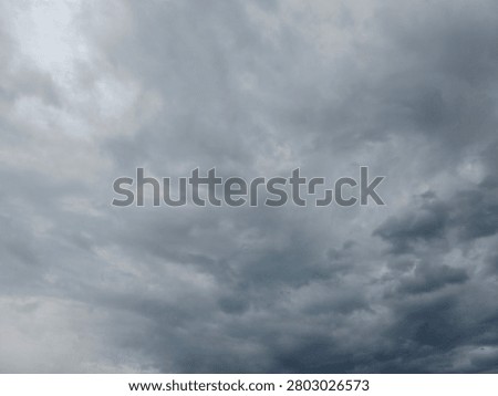 Dramatic overcast sky with dense storm clouds, ideal as a background for weather concepts, presentations, design projects, and atmospheric visual storytelling.