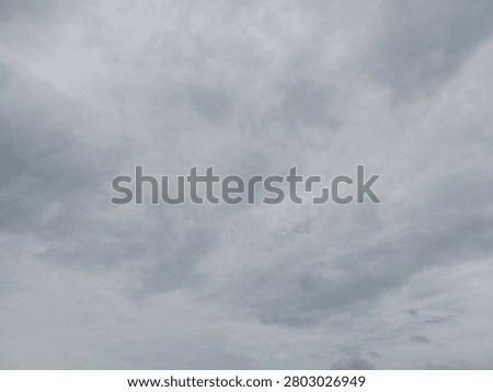 Dramatic overcast sky with dense storm clouds, ideal as a background for weather concepts, presentations, design projects, and atmospheric visual storytelling.