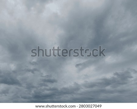 Dramatic overcast sky with dense storm clouds, ideal as a background for weather concepts, presentations, design projects, and atmospheric visual storytelling.