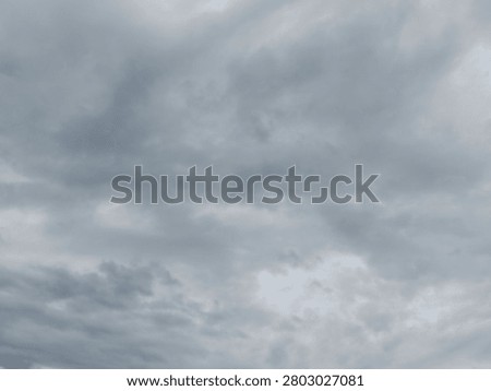 Dramatic overcast sky with dense storm clouds, ideal as a background for weather concepts, presentations, design projects, and atmospheric visual storytelling.