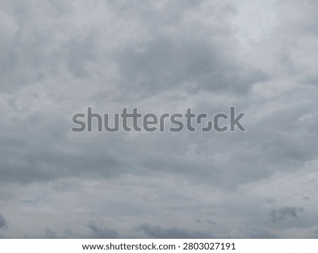 Dramatic overcast sky with dense storm clouds, ideal as a background for weather concepts, presentations, design projects, and atmospheric visual storytelling.