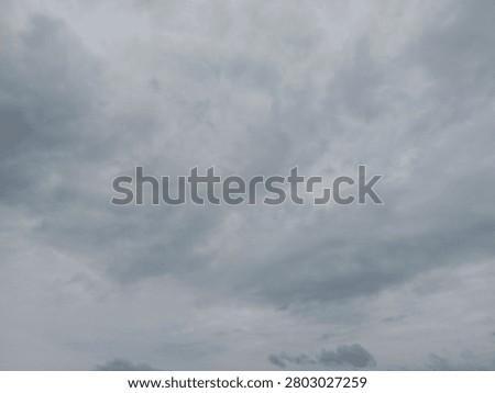 Dramatic overcast sky with dense storm clouds, ideal as a background for weather concepts, presentations, design projects, and atmospheric visual storytelling.