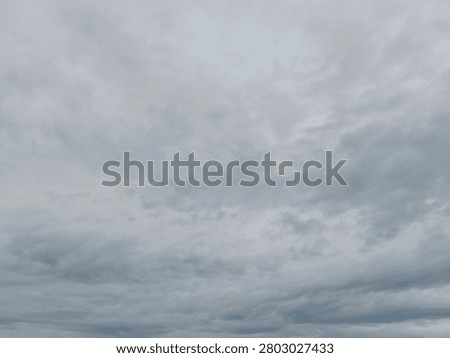 Dramatic overcast sky with dense storm clouds, ideal as a background for weather concepts, presentations, design projects, and atmospheric visual storytelling.