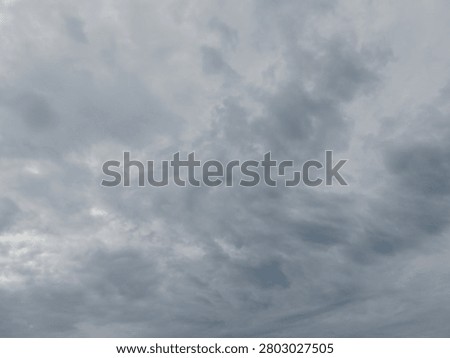 Dramatic overcast sky with dense storm clouds, ideal as a background for weather concepts, presentations, design projects, and atmospheric visual storytelling.