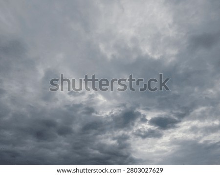 Dramatic overcast sky with dense storm clouds, ideal as a background for weather concepts, presentations, design projects, and atmospheric visual storytelling.