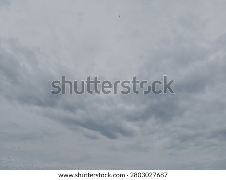 Dramatic overcast sky with dense storm clouds, ideal as a background for weather concepts, presentations, design projects, and atmospheric visual storytelling.