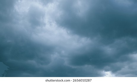 A Dramatic Overcast Sky is Filled with Dark Clouds and Unique Atmospheric Elements