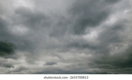A Dramatic Overcast Sky Filled with Dense Grey Clouds, Perfect for Artistic Inspirations