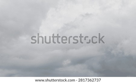 Dramatic Overcast Sky with Thick Gray Storm Clouds Before Heavy Rain Dark Moody Weather Background Abstract Cloud Texture. 
