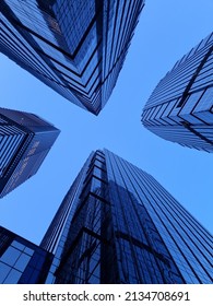 Dramatic Perspective With Low Angle View Of Skyscrapers Looking Up To The Sky, Jakarta - Ashta Office. Vanishing Point