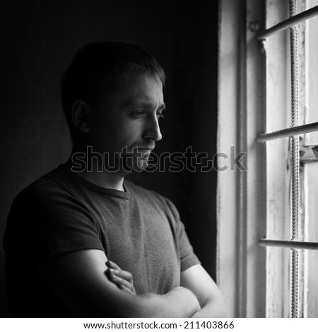 dramatic portrait of alone man