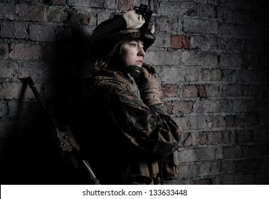 Dramatic Portrait Of A Beautiful Girl In Uniform. Women In The Military. U.S. Marines. Thoughts About The War. Young Soldier. The Spirit Of Liberty.