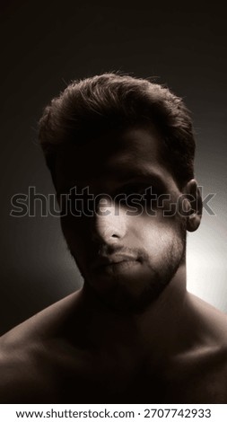 Dramatic portrait of man with post-procedure nose bandage in focused side lighting. Concept of cosmetic recovery, emotional introspection, aesthetic surgery storytelling, and male beauty narratives.