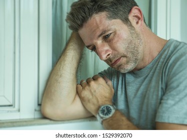 Dramatic Portrait Of Middle Aged Sad And Depressed Man In Pain Feeling Stressed And Frustrated Suffering Depression Problem And Anxiety Crisis Looking Desperate And Gloomy