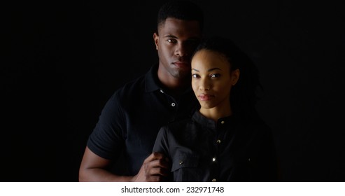 Dramatic Portrait Of Strong Young Black Couple