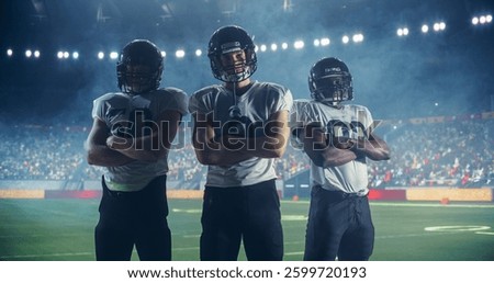 Dramatic Portrait of Three Diverse Athletic Football Players Standing Confidently on the Field, Posing Crossed Arms and Looking at Camera. Professional Footballers Before Championship Game