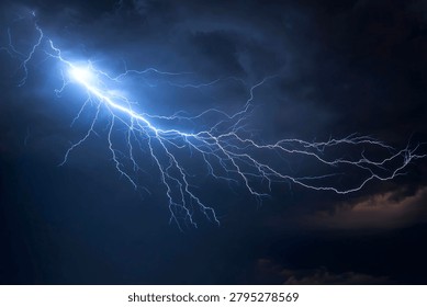 Dramatic and powerful bright blue-white lightning bolt striking through a dark, ominous, and stormy night sky during a severe thunderstorm, showcasing raw electrical energy and natural force.