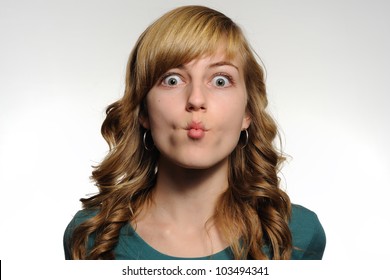 Dramatic Pucker. Teenage Girl Making A Dramatic Pucker Expression With Her Face. Note: Not Isolated.