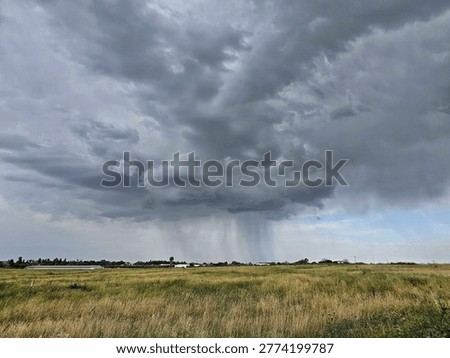 Dramatic rain clouds in southern Golan Heights in spring, Israel