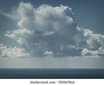 Dramatic Rainy Clouds over Sea