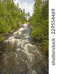 Dramatic Rapids in the Rushing River in Rushing River Provincial Park in Ontario