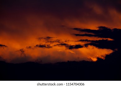 dramatic red and black sky at the sunset