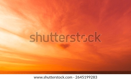 Dramatic red, orange sunset sky over sea in the evening, Red storm clouds sun dawn, Horizon sea sky landscape colorful sunrise, Dusk sky background