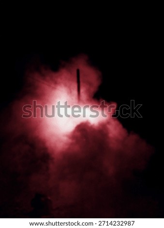 Dramatic Red Smoke Cloud – Illuminated Pyro Effect Against Dark Background with Vertical Element