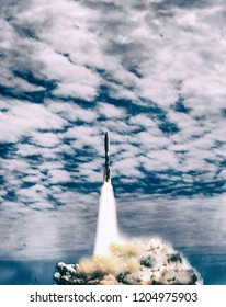 Dramatic rocket launch.  The elements of this image furnished by NASA.