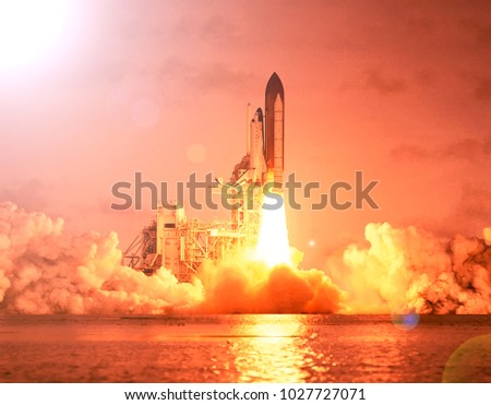 Dramatic rocket launch.  The elements of this image furnished by NASA.