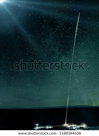 Dramatic rocket launch. Rocket launch at night.  The elements of this image furnished by NASA.
