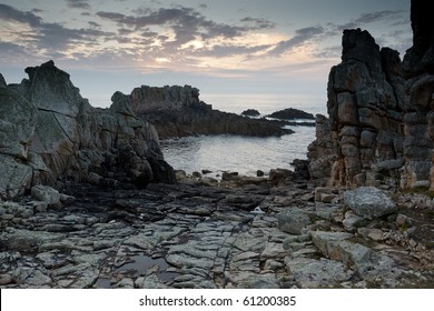 dramatic rocky coastline at dusk, ouessant island, brittany, france - Powered by Shutterstock