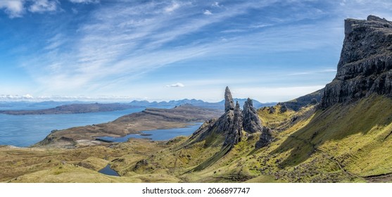 Dramatic Scottish Highlands Summer View With Blue Sky At The Old Man Of Storr On The Isle Of Skye United Kingdom. Background Photo Of Stunning Landscapes