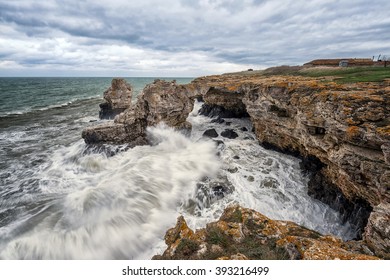 Dramatic seascape with rocks and waves - copy space