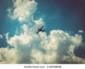 Dramatic Silhoutte Of An Airplane In The Sky