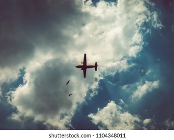 Dramatic Silhoutte Of An Airplane In The Sky