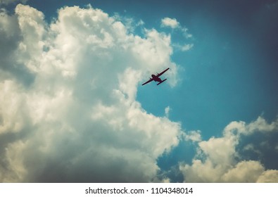 Dramatic Silhoutte Of An Airplane In The Sky