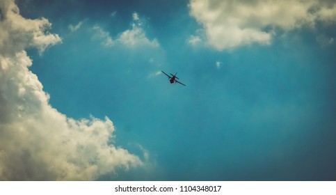 Dramatic Silhoutte Of An Airplane In The Sky