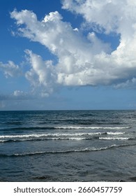 Dramatic sky clouds over ocean