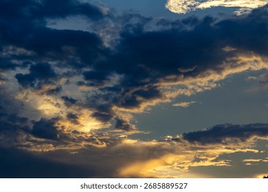Dramatic sky with clouds at sunset