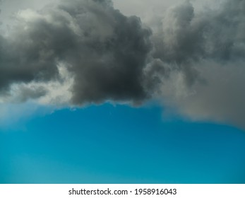 Dramatic sky, dark rain clouds in blue sky - Powered by Shutterstock - Get 15% off with code: PIKWIZARD15