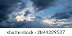 Dramatic sky with dark storm clouds before storm