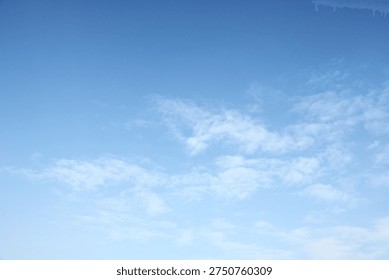 Dramatic Sky with Fluffy White Clouds and Blue Sky Background, Perfect for Nature and Design Concepts