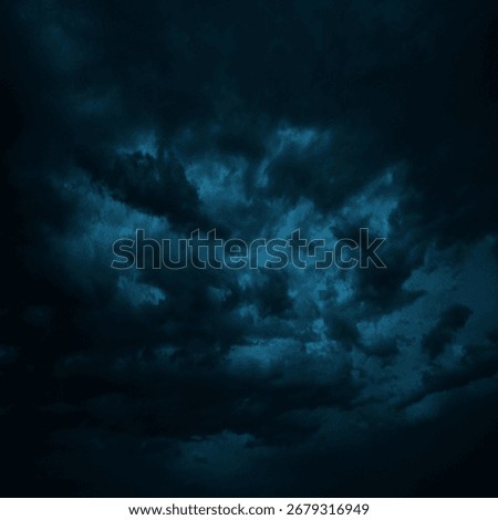 Dramatic sky with heavy clouds. Black dark blue green grey night cloudy sky. Thunderstorm storm rain moonlight wind cyclone hurricane. Ominous frightening fantastic epic.